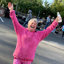 breast cancer survivor celebrating