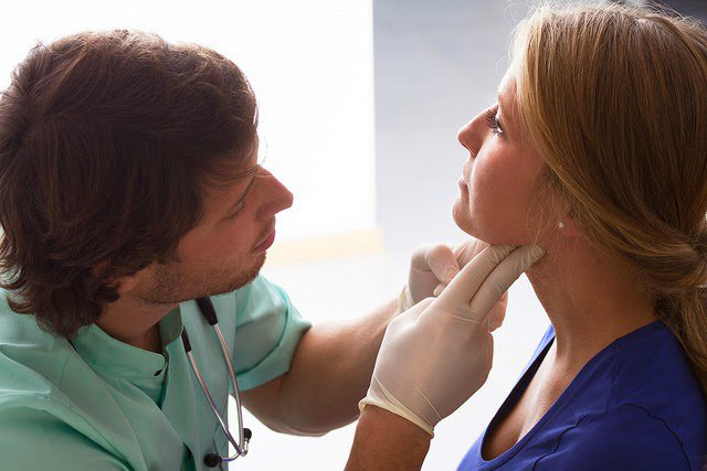 provider takes care of patient at annual doctor checkup appointment