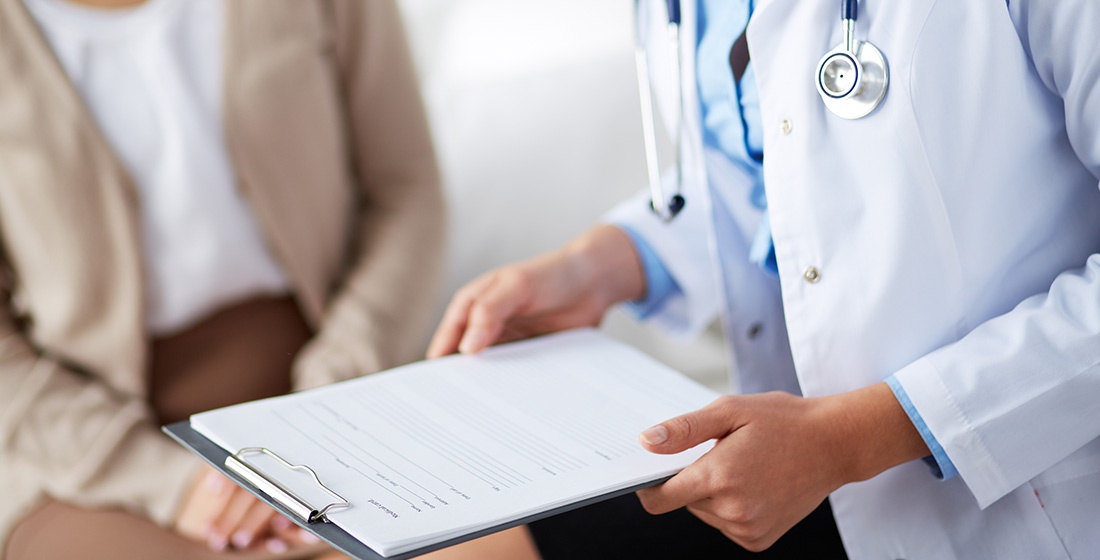 Doctor holding clipboard